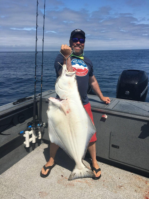 Pro staff Don Koskella holds up a chunk of a Pacific Halibut taken off the Oregon Coast with Maruto Circle Hooks